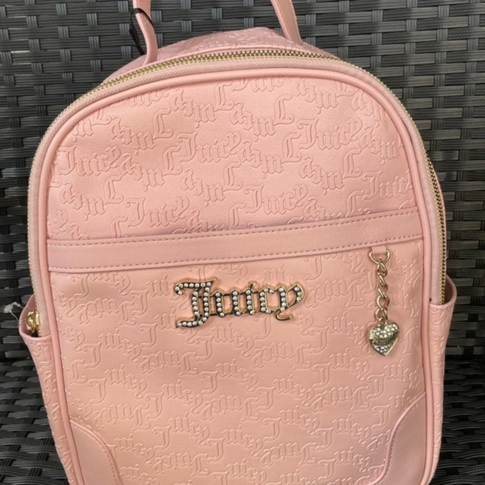 JUICY COUTURE,Juicy Couture Light Pink Backpack.